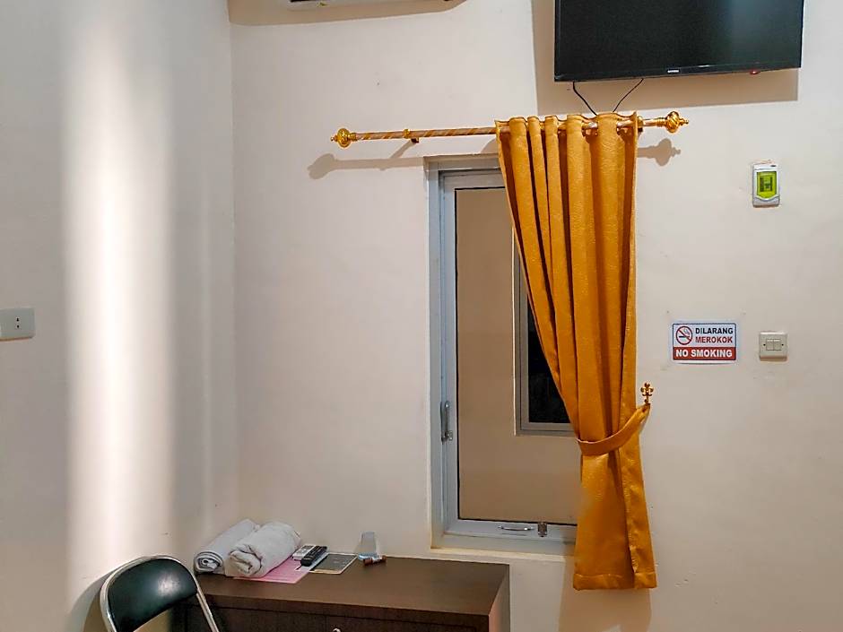 New Era Family Homestay Binjai Mitra RedDoorz