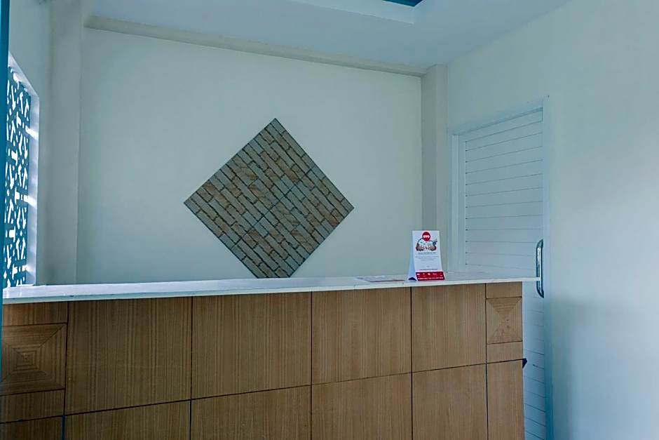 OYO Flagship 1603 Antosa Family Residence Silver Key