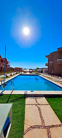 Green Beach Camp & Hotel