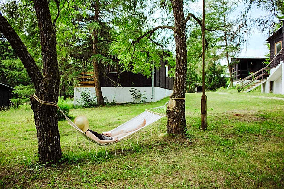 Pustelnia Supraśl - domki nad rzeką