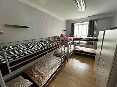 Single Bed in Dormitory Room
