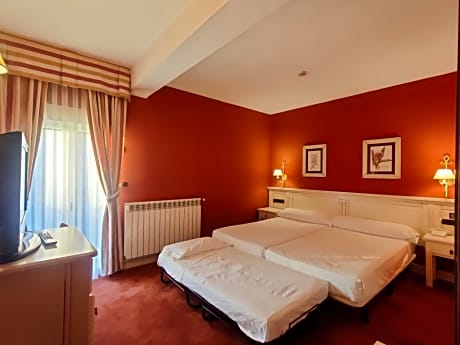 Triple Room (2 Adults + 1 Child)