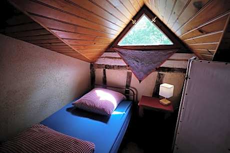 Single Bed in Dormitory Room