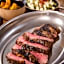 Fuego Steakhouse and Tapas -Tomahawk Potto