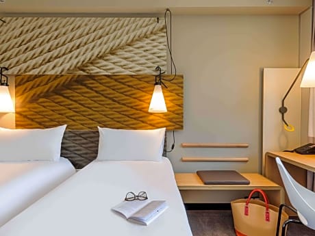 Room With 2 Single Beds Equipped With The New Bedding