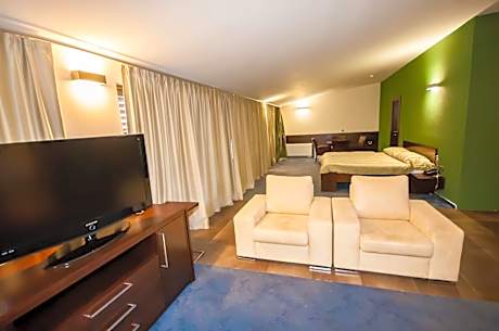 Two-Bedroom Suite with Balcony and Sea View