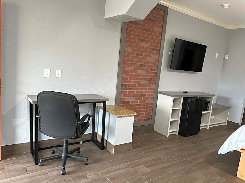 The Symphony Inn & Suites