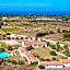 Lofts with private outdoor area and swimming-pool in Badesi