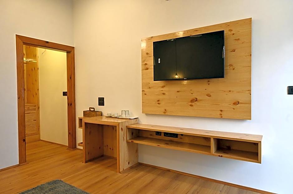 Silver fern by the Hillside