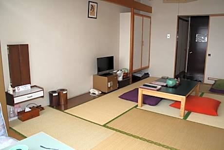 Quadruple Room with Shared Bathroom