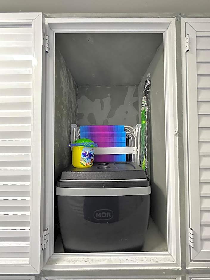 Apartamentos a Beira Mar, Aconchegantes e Modernos, a 3 Minutos da Praia com Ar Condicionado, Sacada Gourmet, Garagem e Portaria 24h