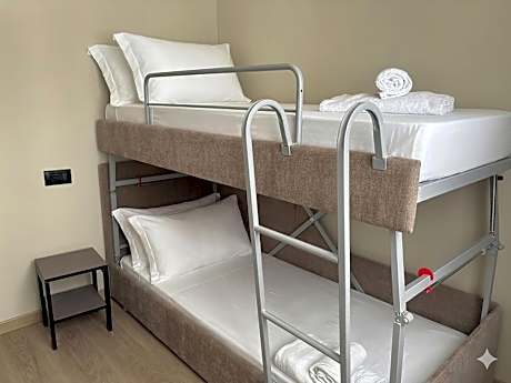 Executive Family Room with One Queen Bed, One Single Bed and One Sofa Bunk Bed - Non-Smoking