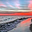 Sunrise Surprise 9th floor 2BR 2 BA King Suite Beach shuttle, heated pool!