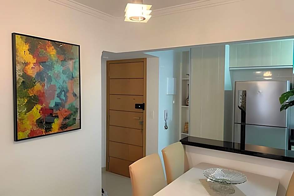 Apartamentos aconchegantes frente mar