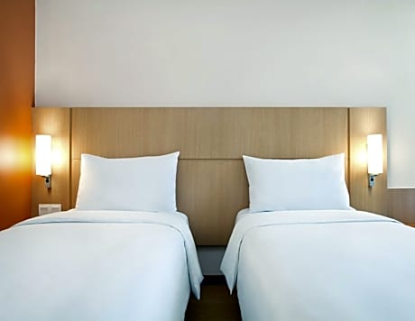 Family Room with Queen Bed and Two Single Beds