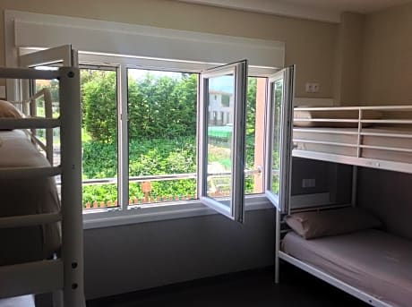 Single Bed in Dormitory Room