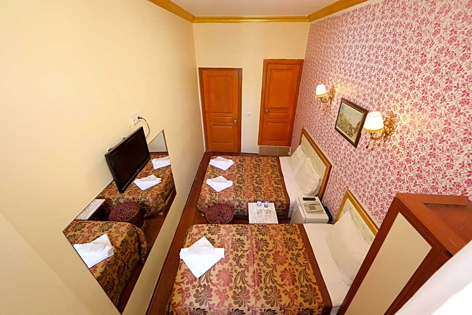 Photo 1 of 6 of Triple Room
