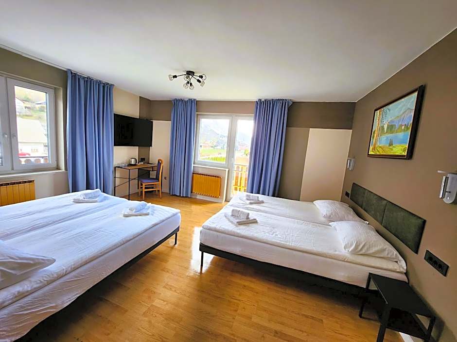 Photo 1 of 7 of Quadruple Room with Private Bathroom