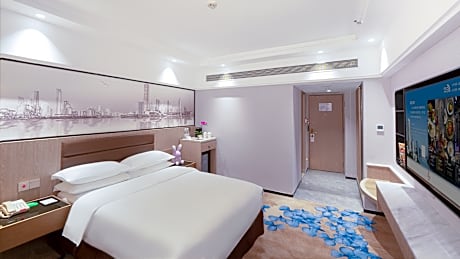 Elegant City View Queen Bedroom