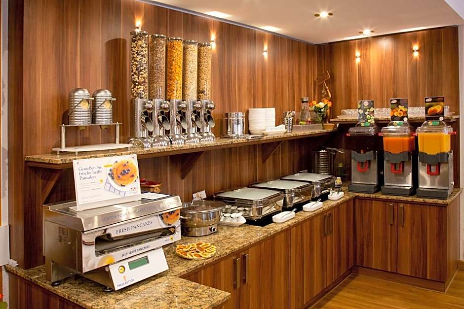 Tiptop Hotel Burgschmiet Garni