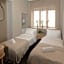 Happy Inn Rooms & Suites
