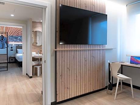 Quadruple Room with One Double and Two Single Beds