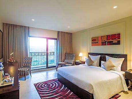 Deluxe King Room with Complimentary one free ticket for Trampoline Park at Imagicaa per room per stay and 20% discount on Food and Beverage
