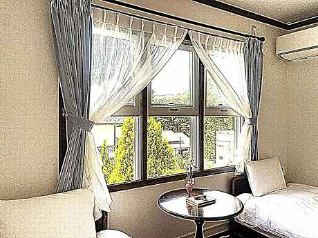 Triple Room with Shared Bathroom