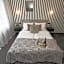 Happy Inn Rooms & Suites