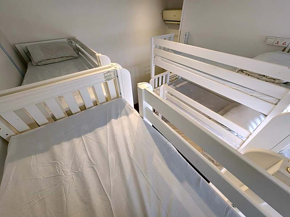 Photo 1 of 5 of Bed in Triple-Deck 12-Bed Mixed Dorm