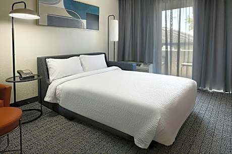 1 Bedroom Suite, 2 Double, Sofa bed, Courtyard view, Balcony, Patio