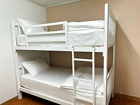 6 Bunk Beds in Male Dormitory Room