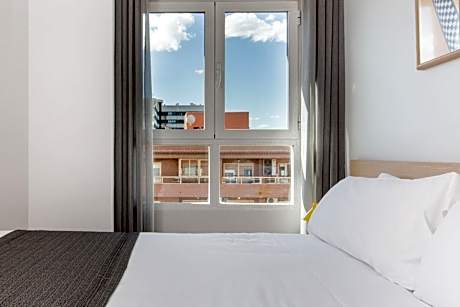 One-Bedroom Apartment (2 Adults + 2 Children)