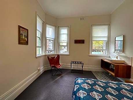 1st Floor Corner Room with Shared Bathroom