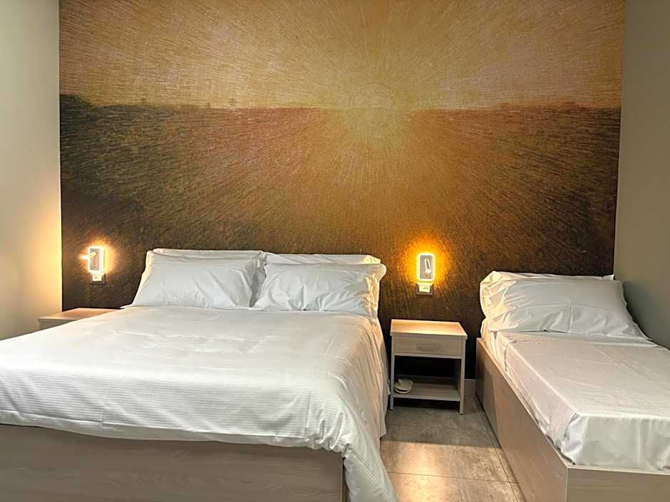 Photo 1 of 27 of Triple Room with Private Bathroom