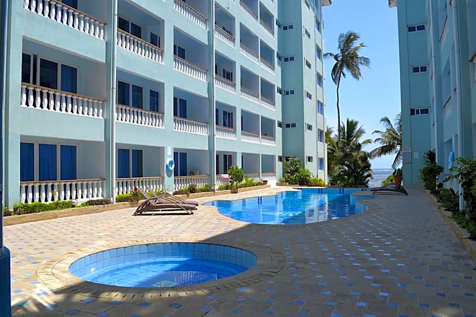 Cowrie Shell Beach Apartments Official