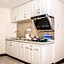 Guangzhou Pengman Apartment Zhengjia Huanshi Branch