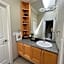 A cozy bedroom with a private washroom close to YVR Richmond