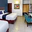 Capital O Hotel 522