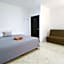 "Spacious Suite with 4 Bedrooms and Amenities"