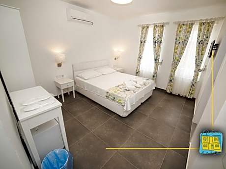 Standard Room with one double bed and one single bed