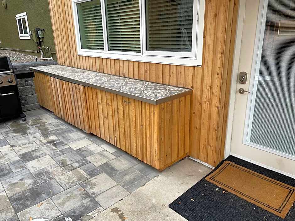 Bright poolside walkout two bedroom basement suite in the Okanagan