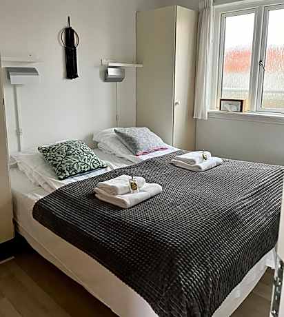 One-Bedroom Apartment with Balcony and Sea View