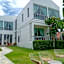 White Wall Riverfront Hotel