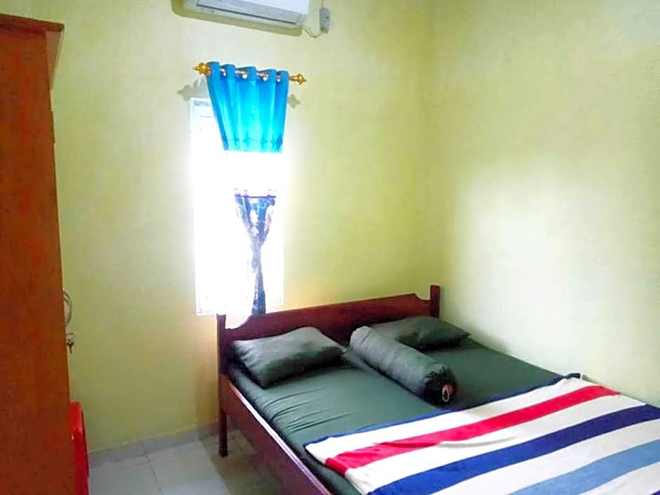 Hotel O Wisma Nadira Near SPBU PT. Trijaya Pugung PENENGAHAN