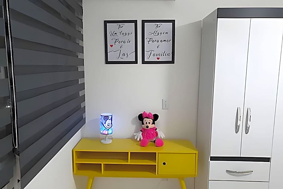 Apartamentos aconchegantes frente mar