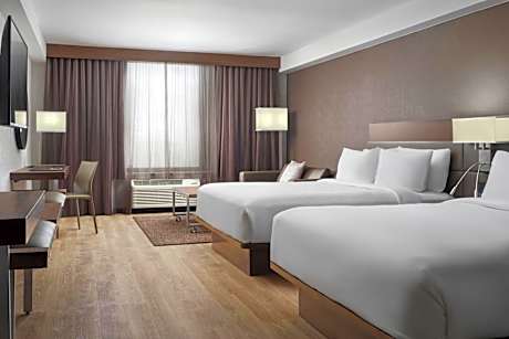 Deluxe Queen Room with Two Queen Beds and Sofa Bed