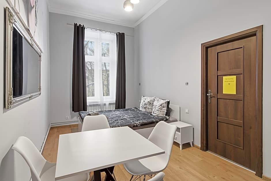 Queen Apartments