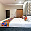 FabHotel Dhanvitha Suites