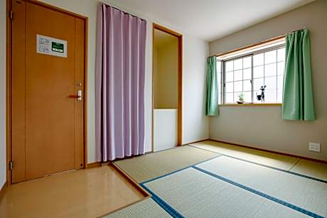 Quadruple Room with Shared Bathroom